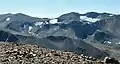 North aspects of Parker Peak (left), Koip Peak (right of center), and Kuna Peak (right) as seen from Mount Gibbs.