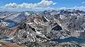 View from Dunderberg Peak looking west. Page Peaks is the dark triangle above East Lake. Summit Lake to left, Hoover Lakes lower left, East Lake lower right. Camiaca Peak (reddish) left of center, Gabbro Peak lower right.