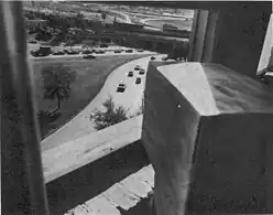 A view through a window to Elm Street, Dealey Plaza, from the shooter's location in the Depository to kill Kennedy, the so-called "sniper's nest".