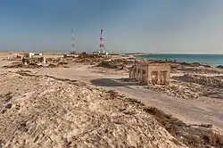 View from Jebel Ghariyah of ruined buildings in the old village of Al Ghariyah