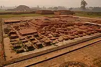 Landscape of Vikramashila university ruins, the seating, and meditation area. It was one of the most important centers of learning, during the Pala Empire, established by Emperor Dharmapala. Atiśa, the renowned pandita, is sometimes listed as a notable abbot.