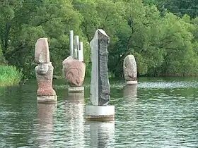 Stone sculptures in Vilnoja lake near Sudervė