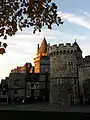 Embas Gate (Porte d'Embas) and old houses (15th c.).