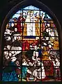 Stained glass window of the coronation of “Our Lady of Assistance”