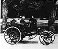 1896 – A . C. Krebs at the steering lever of his system car.