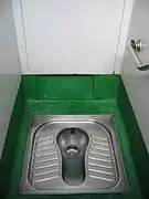 Metal-made squat toilet in Hong Kong