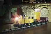 A model train in Výtopna, transporting a pint of beer to a customer