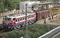 A WAG5 Loco with a freight train at Kathivakkam railway station