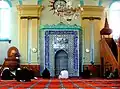 Islamic prayer, facing the mihrab