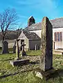 Waberthwaite church showing sundial and cross shaft