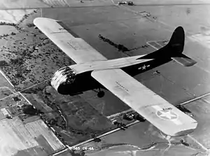 A military glider being pulled aloft