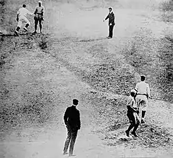 Bill Wambsganss (top left, in white) tags out Miller to complete an unassisted triple play in Game 5 of the 1920 World Series