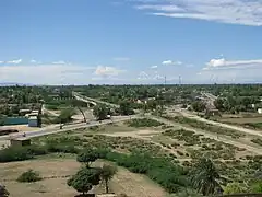 View looking West (Here greenry is primarily due to the irrigation canal passing on the outskirts.)