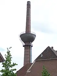 A chimney with water tank in Lengerich, Germany. Most chimneys with water tank look like similiar