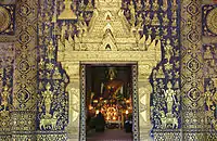 Golden outer wall of Wat Xieng Thong