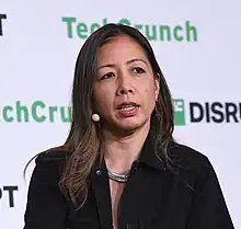 Wendy Tan White facing to right of camera and speaking during panel discussion