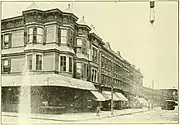 Ornate buildings, all mixed zoning with stores on the ground floor and apartments above