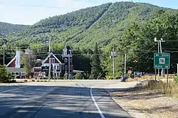 Intersection of NH 16 and NH 41 in West Ossipee. Nickerson Mountain, site of former Mount Whittier Ski Area, rises in background.