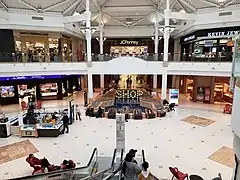 Indoor fountain and surrounding shops