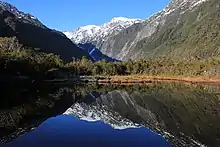 A view across Peters Pool toward the Franz Josef / Kā Roimata o Hine Hukatere