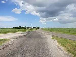 View is south where FM 1163 (left) converges with FM 441 (right).