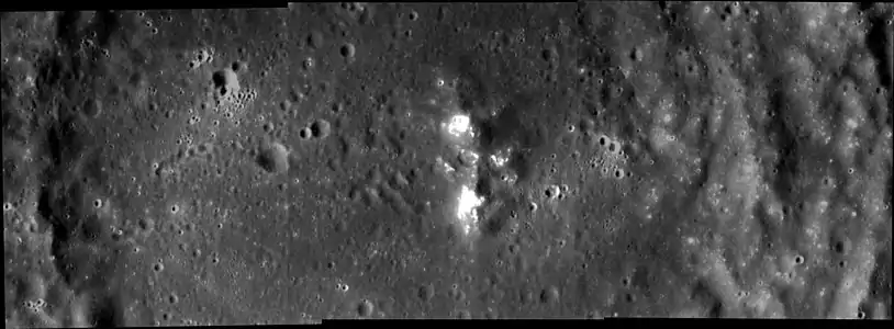 Part of Whitman crater, showing the central peak complex and possible hollows