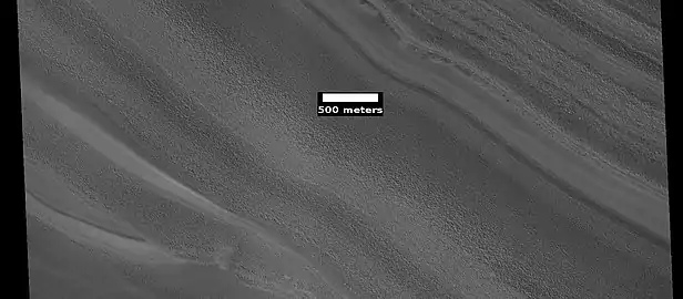 Layers visible along edge of ice cap, as seen by HiRISE under HiWish program