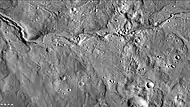 Channels in Arabia, as seen by CTX This channel winds along for a good distance and has branches.  It ends in a depression that may have been a lake at one time.