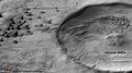 Dunes in Green crater, as seen by CTX camera.  This is an enlargement of the previous image.  Thin dark lines are dust devil tracks.  The crater on the right is within Green crater.  Some old glaciers are visible as arc-shaped ridges.  An arrow points to one of the glaciers.