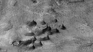 Dunes and dust devil tracks on floor of Huggins Crater, as seen by CTX camera (on Mars Reconnaissance Orbiter).  Dark streaks on dunes are dust devil tracks.  Note: this is an enlargement of the previous image of Huggins Crater.