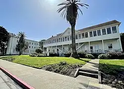 A white two-story building located at 35 Keyes Avenue.