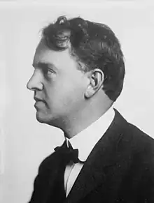 Profile of Leavitt, facing left