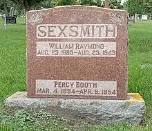 Red stone marker inscribed with Sexsmith's name