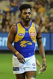 Male athlete in an Australian rules football game