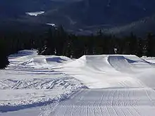 The first three jumps of the easiest of the terrain parks at the top of Conway's Corner