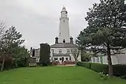 Garden view of the lighthouse and keepers' cottage