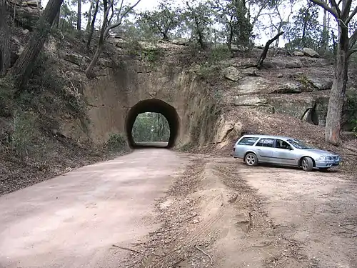 Sandstone tunnel on Wombeyan Caves Road, viewed from eastern side 34°21′S 150°13′E﻿ / ﻿34.350°S 150.217°E﻿ / -34.350; 150.217