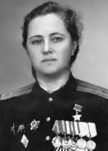 postwar portrait photograph of Zhigulenko wearing her military medals