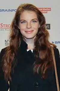 Chestnut color hair also has a reddish tint, but is less red and more brown than auburn hair. This is German singer Yvonne Catterfeld.