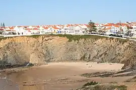 An image of the main settlement of Zambujeira do Mar, a clifftop grouping of residences and commerce