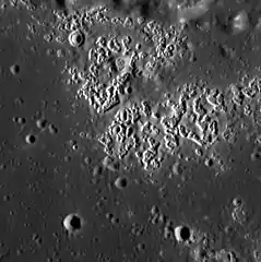 Hollows in Zeami crater.  Image width is about 23.2 km.