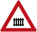 Level crossing with barrier or gate ahead