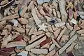 Loose tiles after chiseling the main glazed tile. Fez, Morocco.