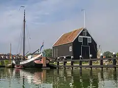 Harbor in the open-air museum copied from the Island of Marken. The Wharf house is a replica; the original wharf house 'De Hoop' is in the Arnhem Netherlands Open Air Museum