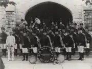 The Red Hill Band in the 1920s with Howard B. Pflieger as the director. The band is standing in front of the St. Mark's Lutheran Church of Pennsburg, PA.