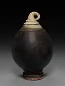 Glazed pottery with brown slip; Bayon period, 12th century