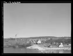 Versailles in November 1940, as captured facing east from the Occum Hydroelectric Plant and Dam by Jack Delano.