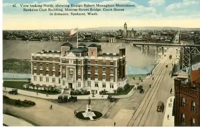 Monaghan Statue and Spokane Club looking north, 1910s