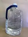 PETE water bottle with attached handle