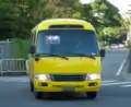 65延剛開通時所使用的TOYOTA Coaster，車頭尚未貼上logo。